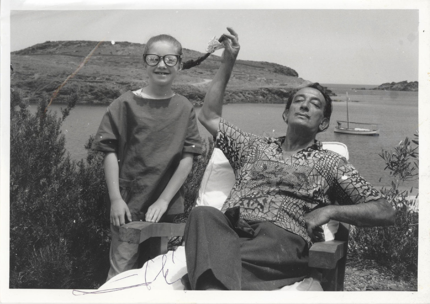 Salvador Dali and a very young Christine Argillet appear in this whimsical family photo.